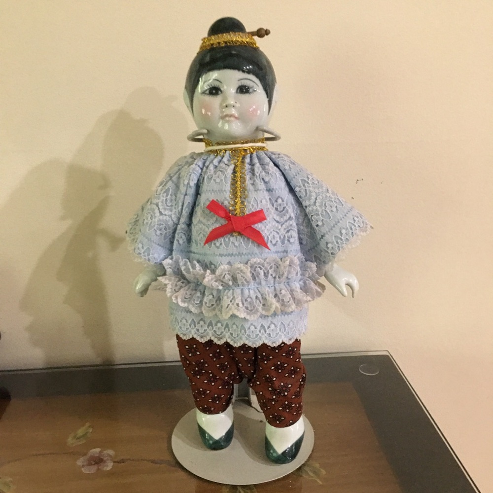 Asian porcelain doll